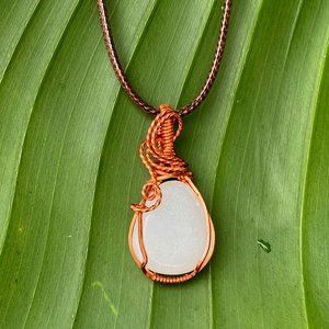 Wire wrapped glowing fairy pendant